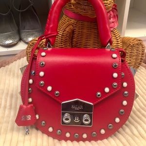 salar round stud shoulder bag